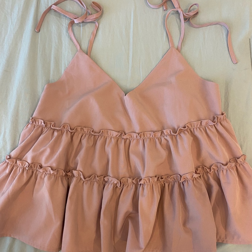 pink ruffled tank top